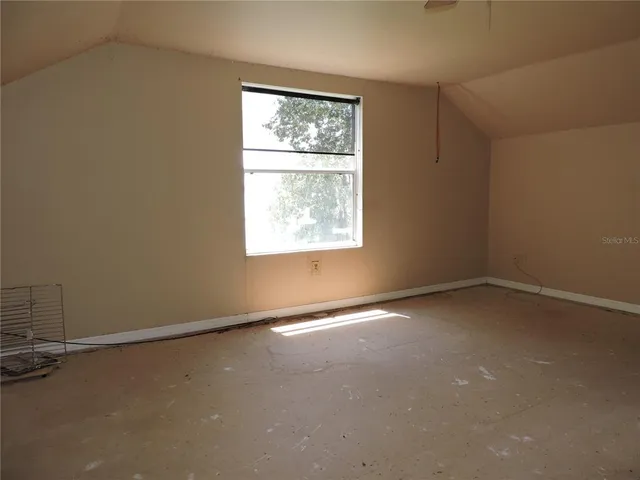 an empty room with a window