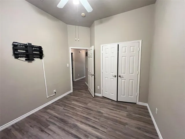 a view of a livingroom with wooden floor