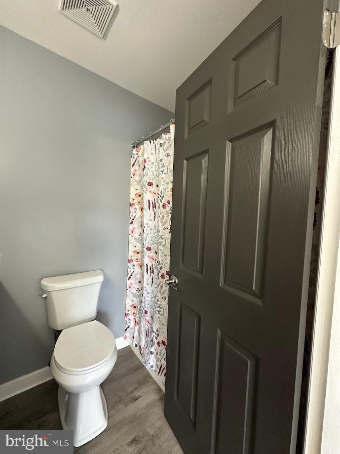 221 Lee Court Enola, PA 17025 - Photo 14 of 22 a bathroom with a toilet and a shower