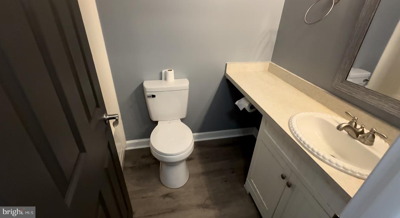 221 Lee Court Enola, PA 17025 - Photo 17 of 22 a bathroom with a sink and a toilet