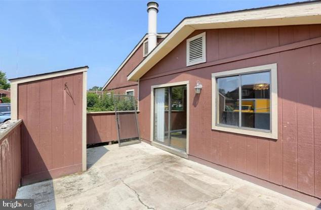 221 Lee Court Enola, PA 17025 - Photo 19 of 22 a view of a house with a wooden fence