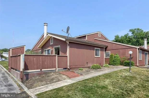 a view of a yard with a slide