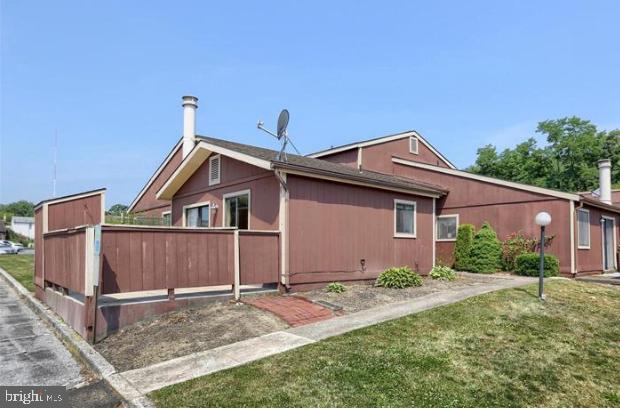 221 Lee Court Enola, PA 17025 - Photo 20 of 22 a front view of a house with garden