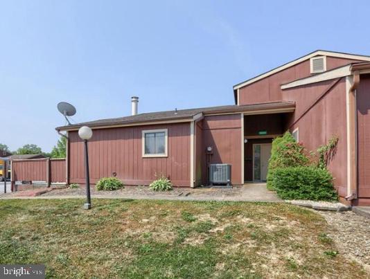 221 Lee Court Enola, PA 17025 - Photo 2 of 22 a front view of a house with garden