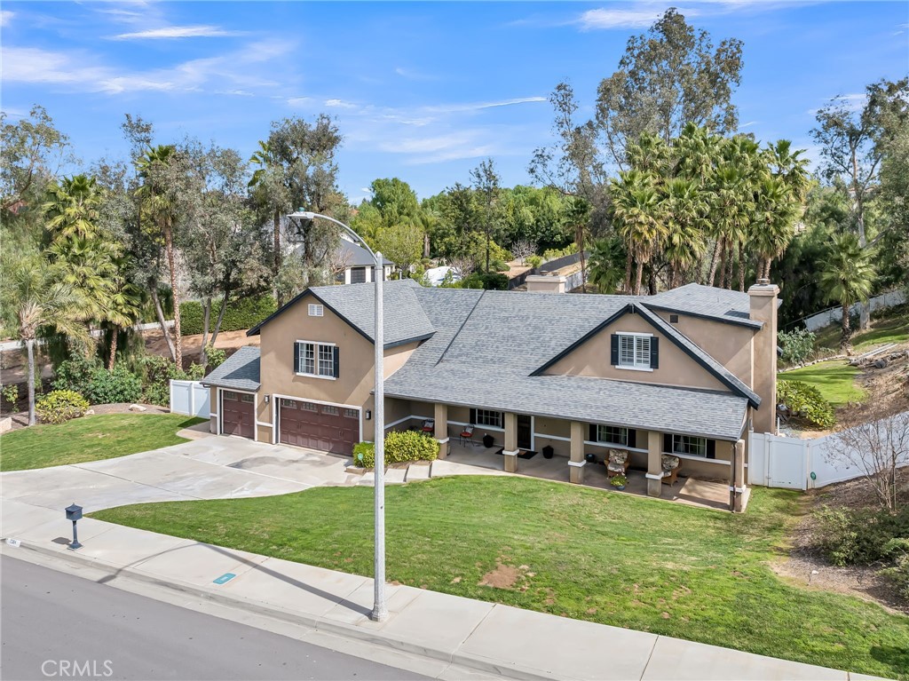 7384 Golden Star Avenue Riverside, CA 92506 - Photo 50 of 57 front view of a house with a yard