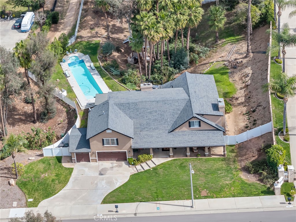 7384 Golden Star Avenue Riverside, CA 92506 - Photo 54 of 57 an aerial view of a house with a garden and trees