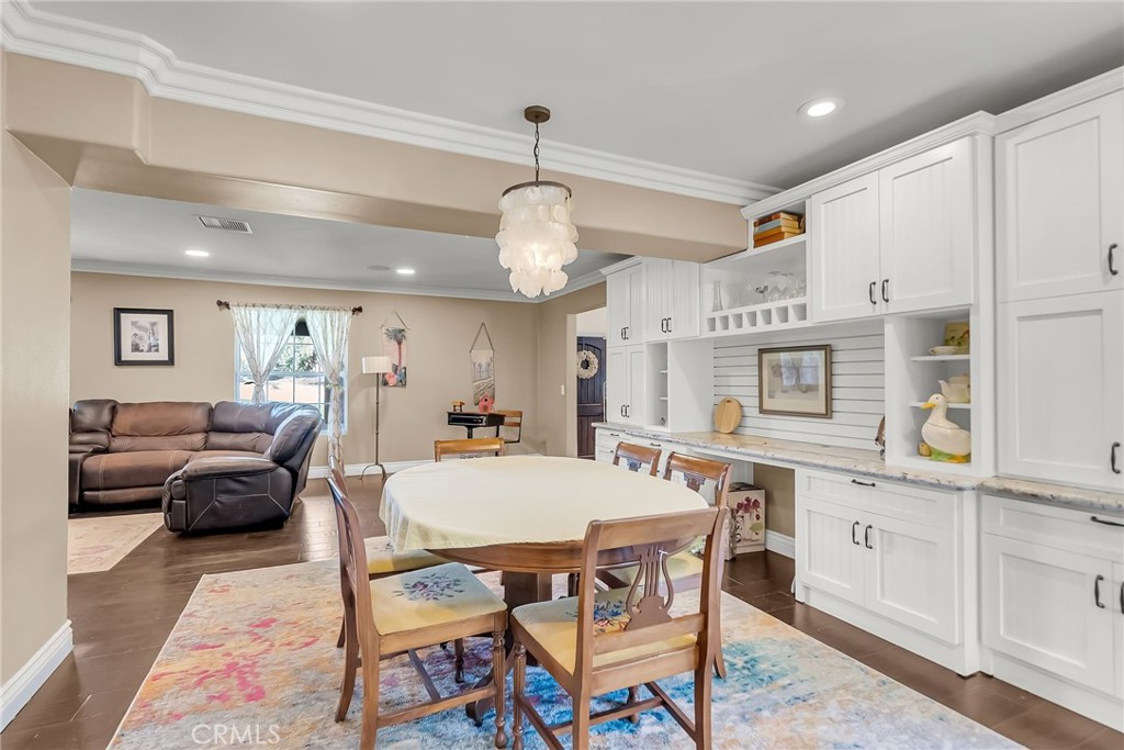 7384 Golden Star Avenue Riverside, CA 92506 - Photo 9 of 57 a view of a dining room with furniture