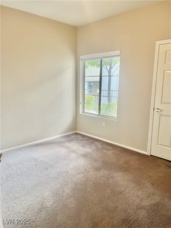 1300 Red Gable Lane, Unit 103 Las Vegas, NV 89144 - Photo 17 of 26 Second Bedroom with Walk in closet