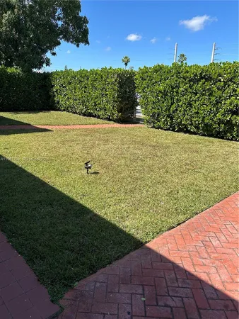 a view of a field with an outdoor space