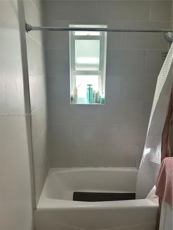 a bathroom with a bathtub