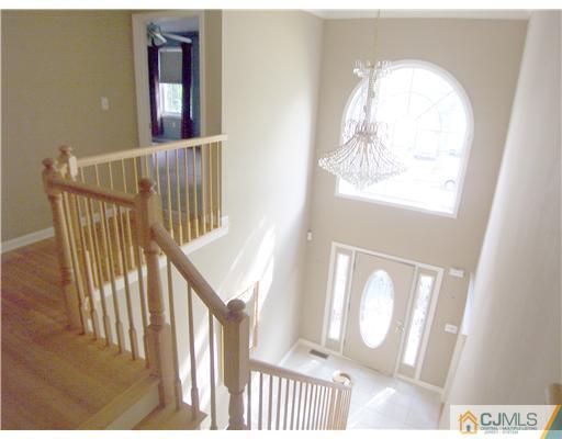 34 West Hill Road Colonia, NJ 07067 - Photo 11 of 25 a view of staircase with open kitchen view