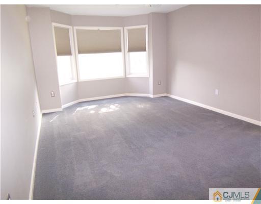 34 West Hill Road Colonia, NJ 07067 - Photo 14 of 25 an empty room with a window