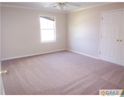 34 West Hill Road Colonia, NJ 07067 - Photo 16 of 25 an empty room with a window
