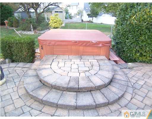 34 West Hill Road Colonia, NJ 07067 - Photo 23 of 25 a view of a backyard with fountain