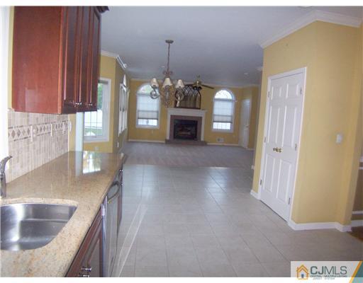 34 West Hill Road Colonia, NJ 07067 - Photo 6 of 25 a view of a kitchen with a sink and dishwasher