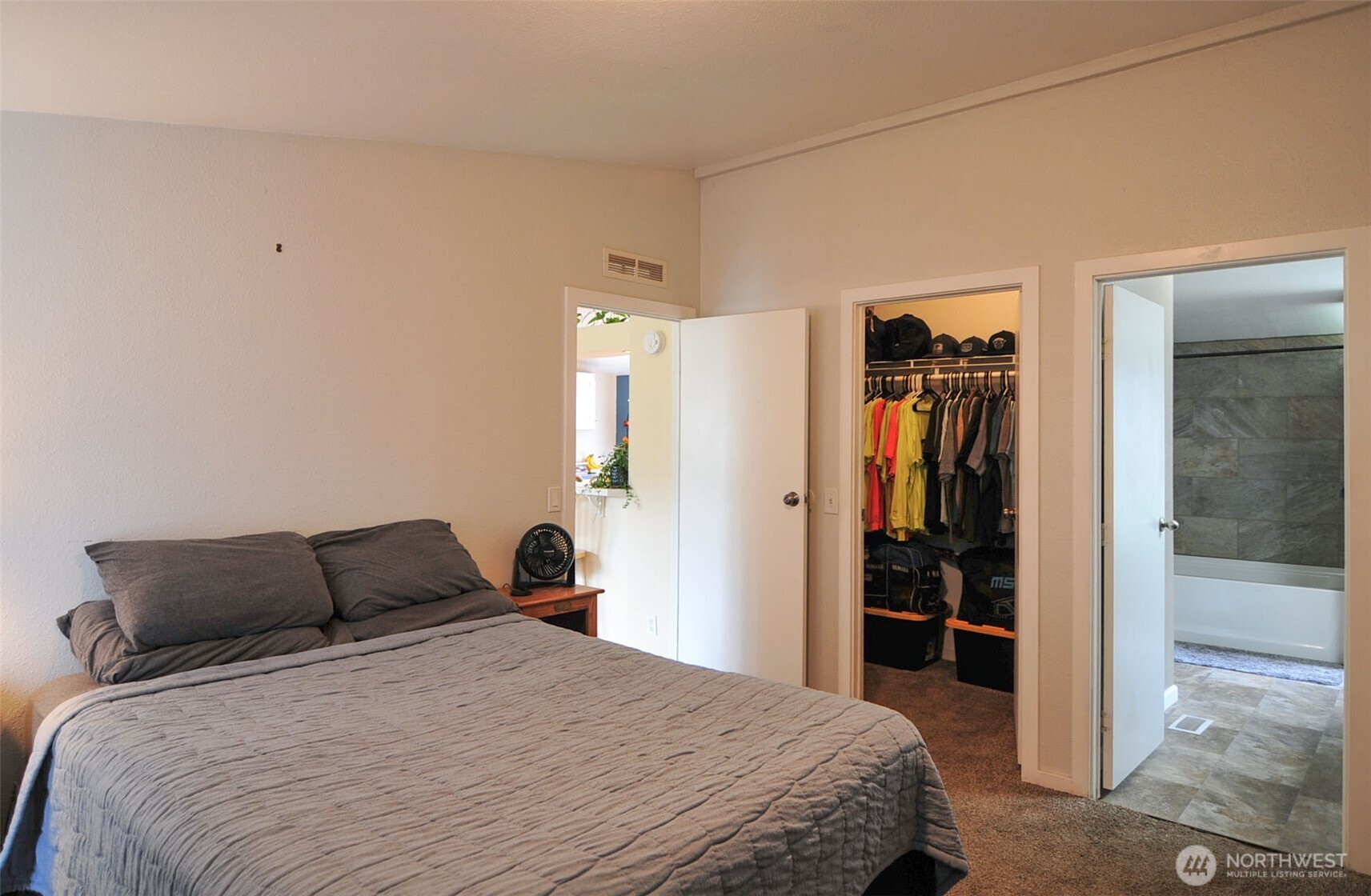 1698 Sunset Drive Wenatchee, WA 98801 - Photo 8 of 22 a bedroom with a bed and closet
