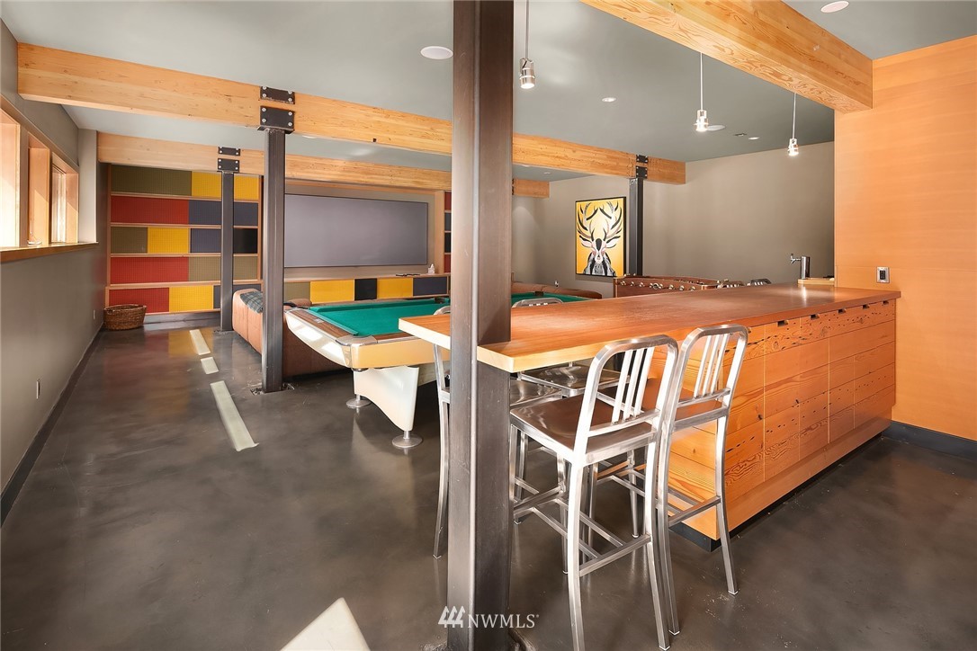 821 Timber Cove Drive Ronald, WA 98940 - Photo 30 of 40 a dining room with furniture and a floor to ceiling window