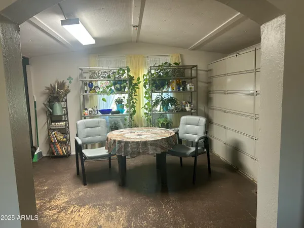 a outdoor space with a couch and chairs