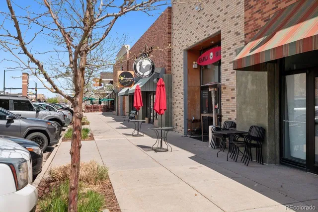 a view of path along with retail shop and retail shops