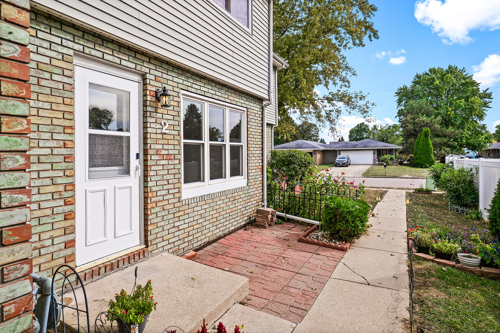 a backyard of a house with lots of green space