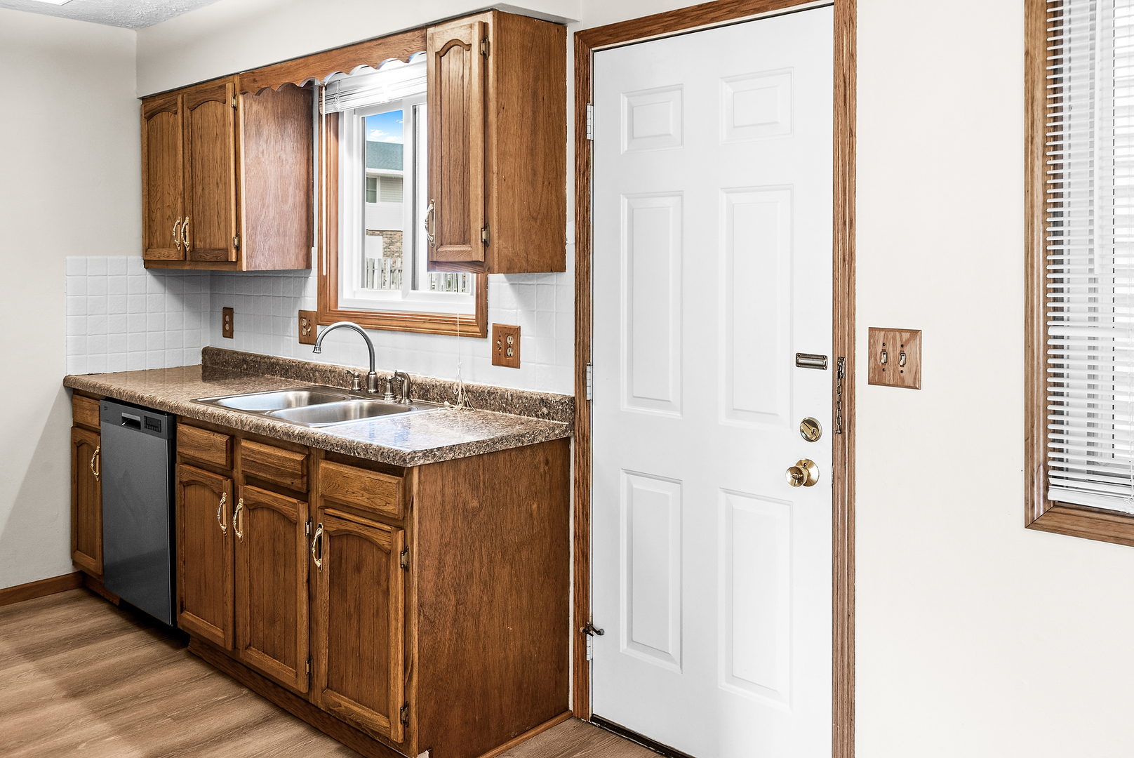 1402 Keller Road Normal, IL 61761 - Photo 14 of 30 a bathroom with a sink and a mirror