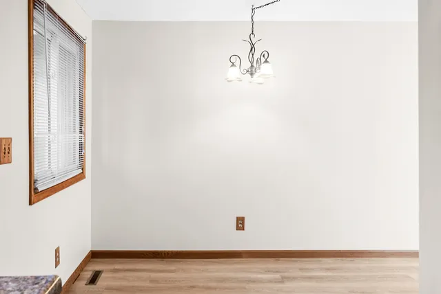 a view of a livingroom with wooden floor