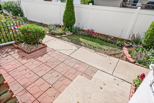 a view of a garden with flowers