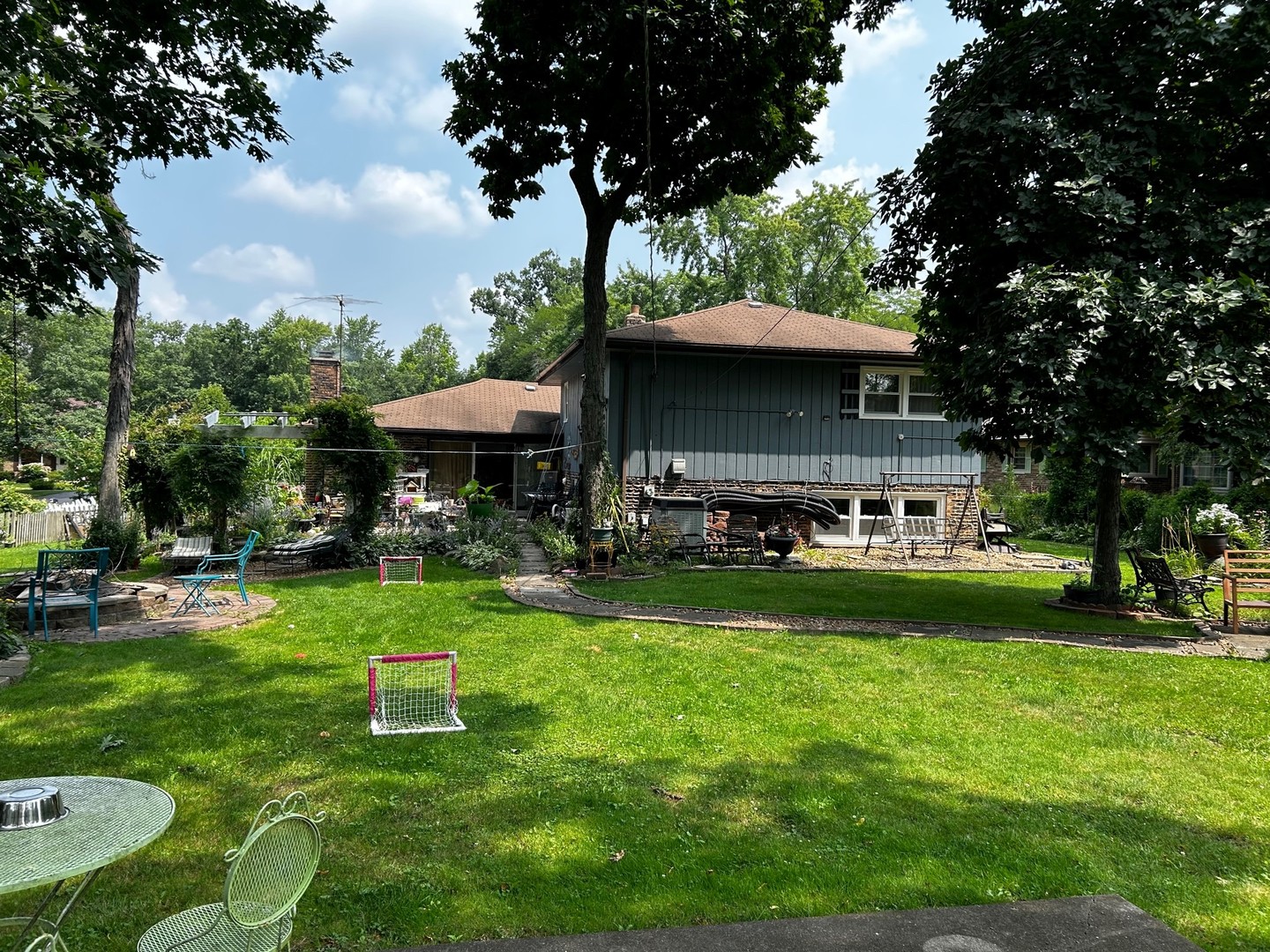 116 Alpine Lane Crete, IL 60417 - Photo 16 of 19 a view of a park with a bench and a slide