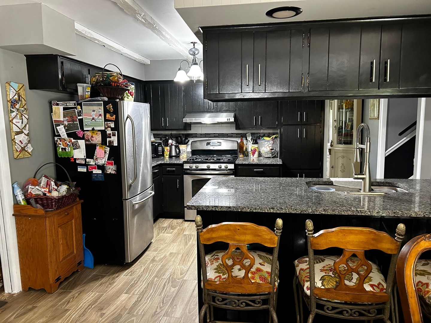 116 Alpine Lane Crete, IL 60417 - Photo 7 of 19 a kitchen with stainless steel appliances granite countertop a refrigerator and a stove top oven