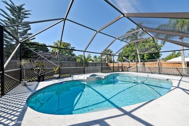 1182 Block Island Road Wellington, FL 33414 - Photo 2 of 15 SCREENED POOL