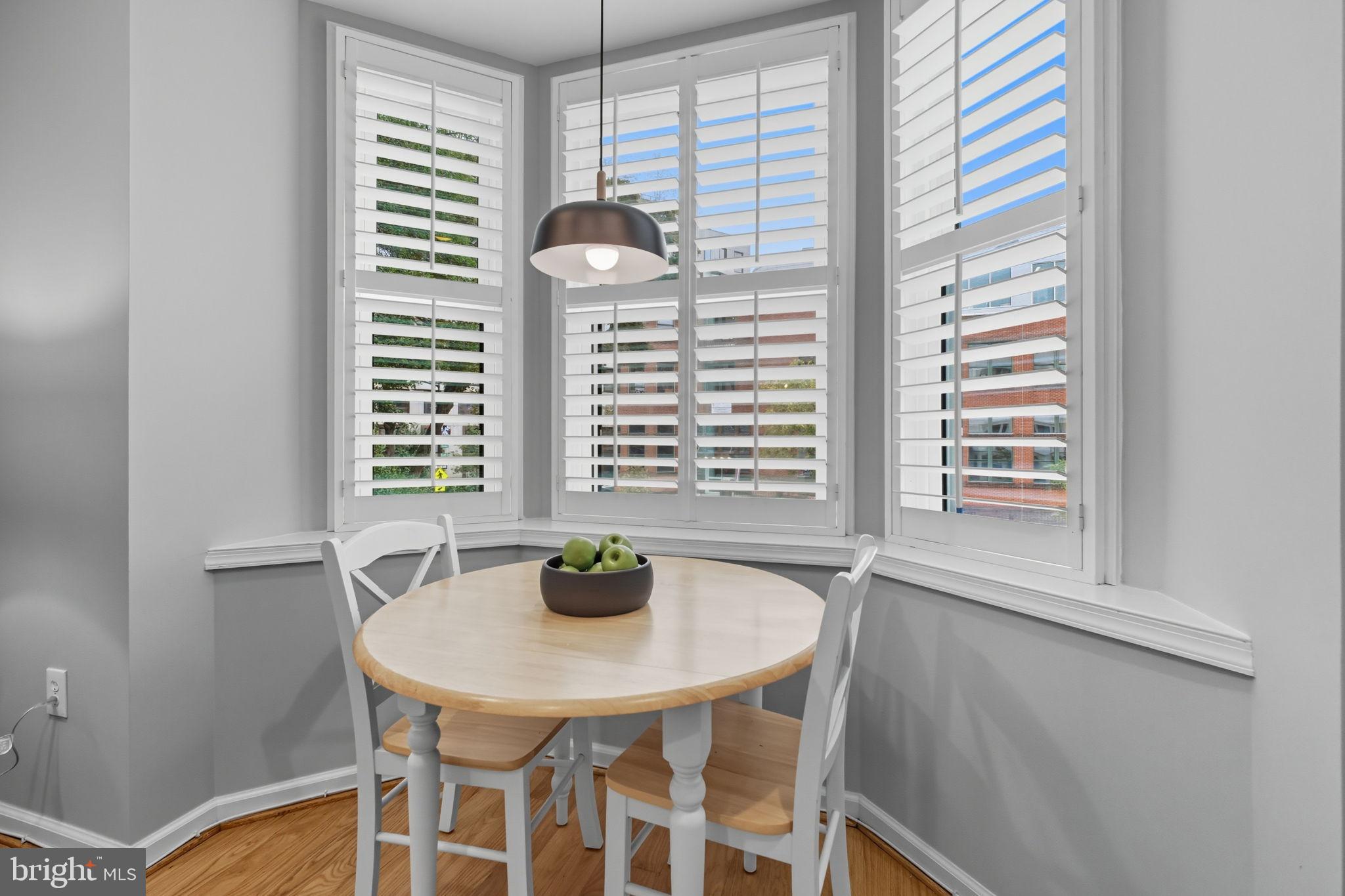 1669 Columbia Road Northwest, Unit 203 Washington, DC 20009 - Photo 11 of 18 a dining room with furniture and window