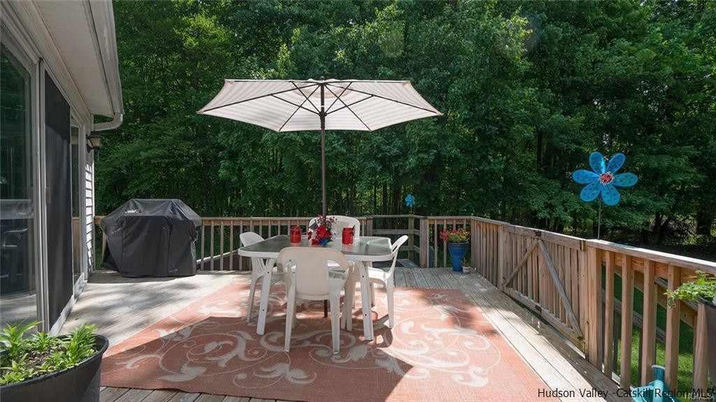 20 Van Orden Road Milton, NY 12547 - Photo 14 of 32 a view of a patio with a table chairs and a garden
