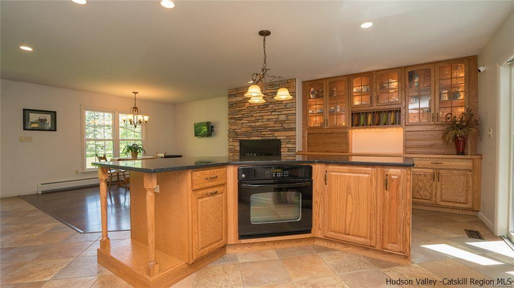 20 Van Orden Road Milton, NY 12547 - Photo 6 of 32 a kitchen with stainless steel appliances granite countertop a refrigerator and a stove top oven