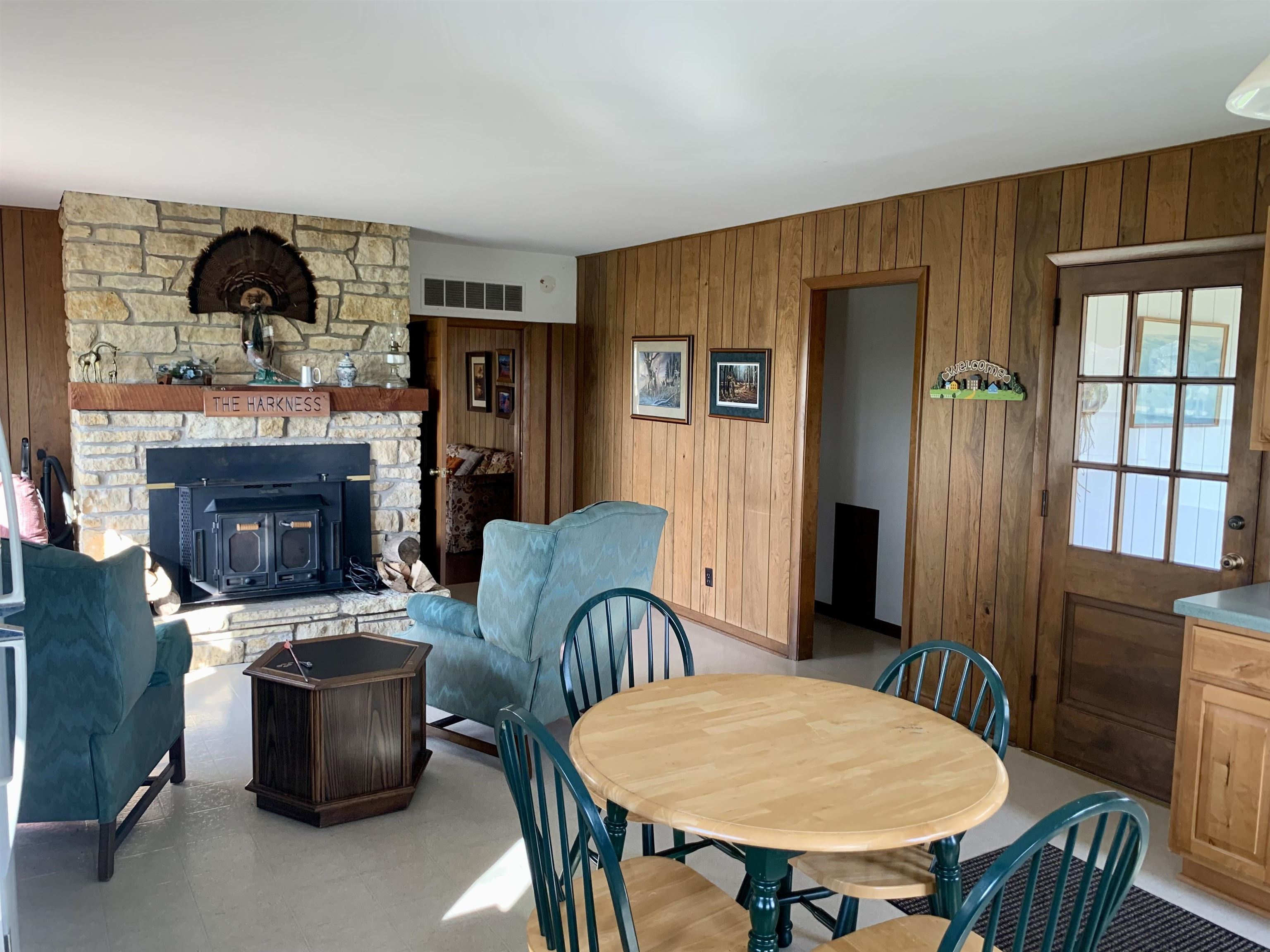 6569 South Speer Road Hanover, IL 61041 - Photo 12 of 59 a view of a livingroom with furniture and a fireplace