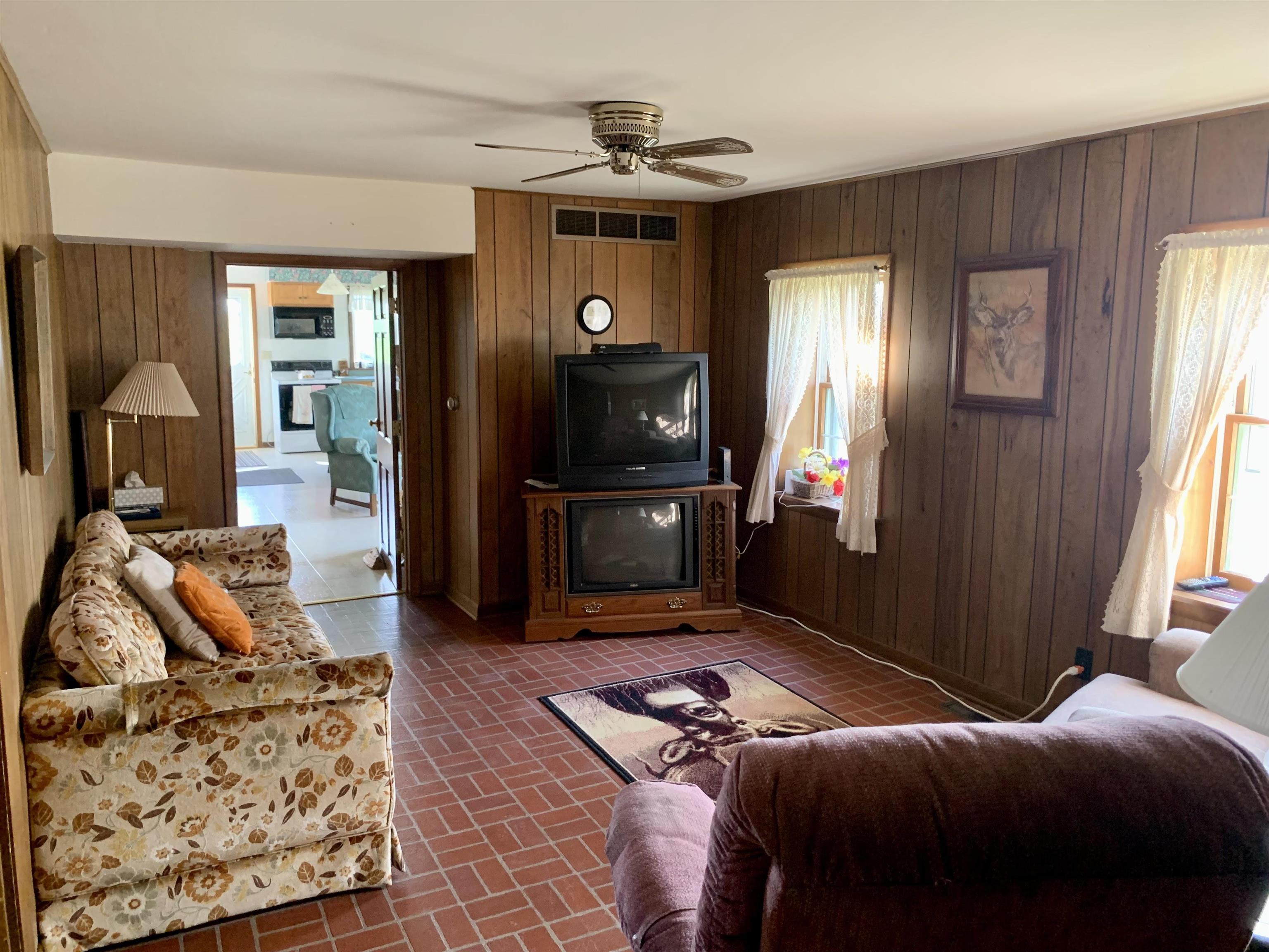 6569 South Speer Road Hanover, IL 61041 - Photo 14 of 59 a bedroom with furniture and a window