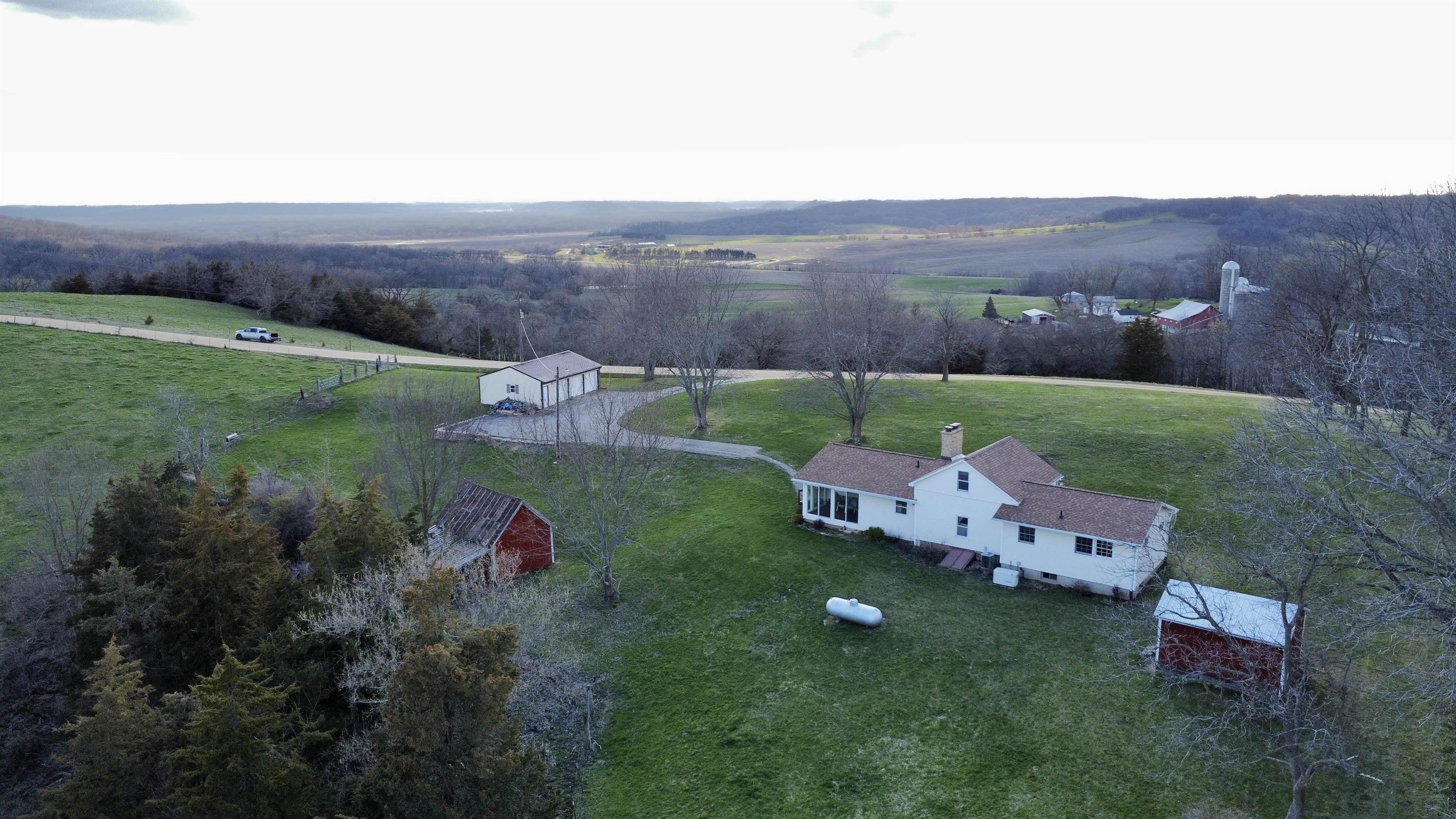 6569 South Speer Road Hanover, IL 61041 - Photo 5 of 59 an aerial view of a house with yard and mountain view in back