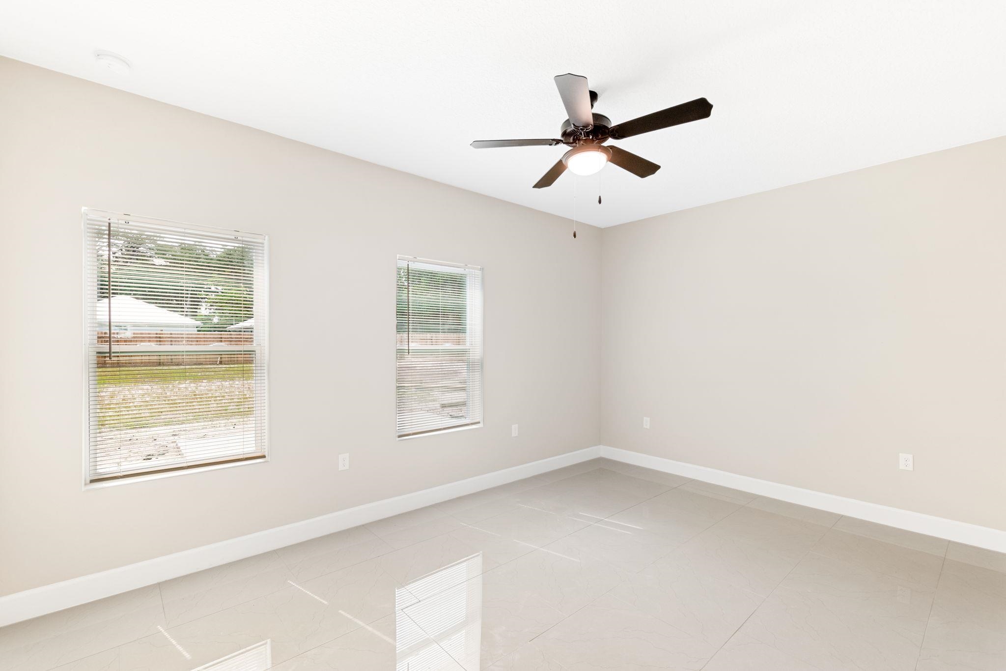 2770 Schaller Road St. Augustine, FL 32084 - Photo 22 of 29 an empty room with windows and fan