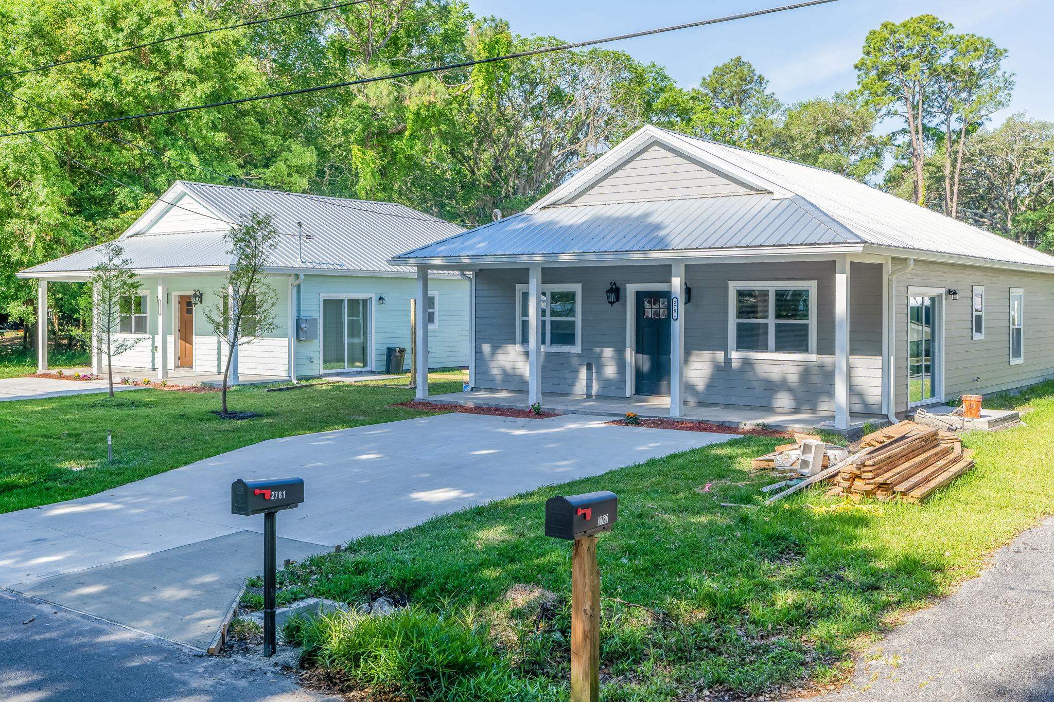 2770 Schaller Road St. Augustine, FL 32084 - Photo 29 of 29 a front view of a house with a yard table and chairs