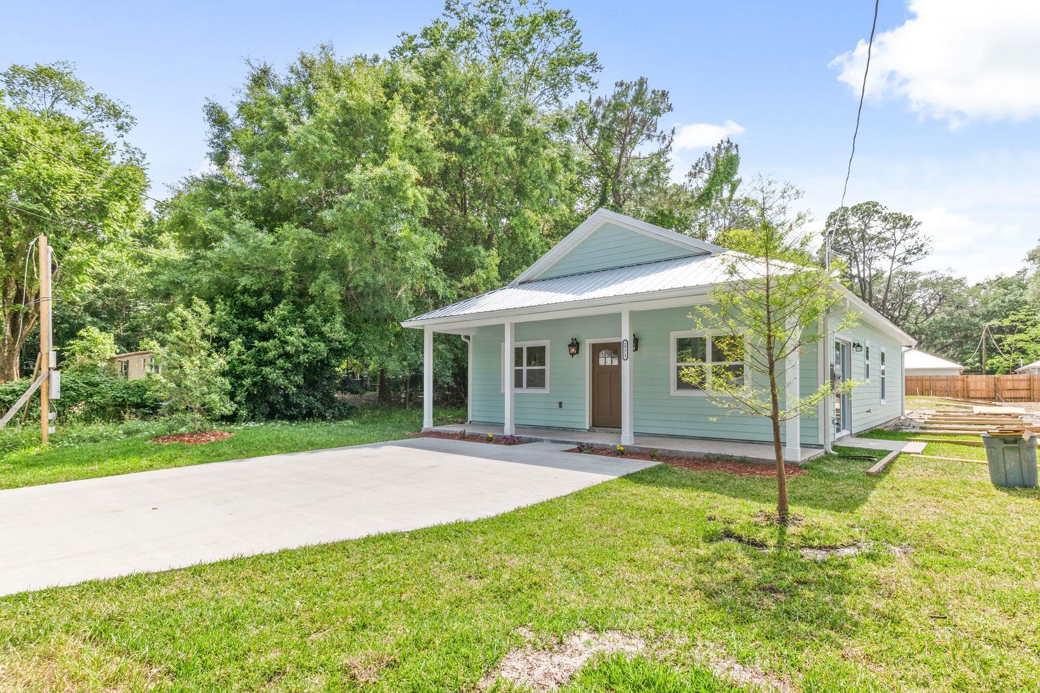 2770 Schaller Road St. Augustine, FL 32084 - Photo 3 of 29 a view of a house with a yard and tree s