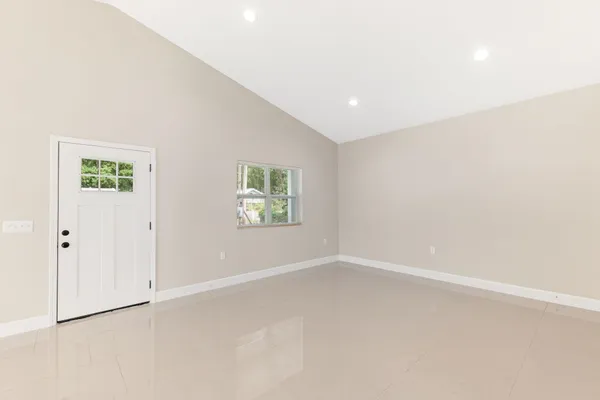 an empty room with windows