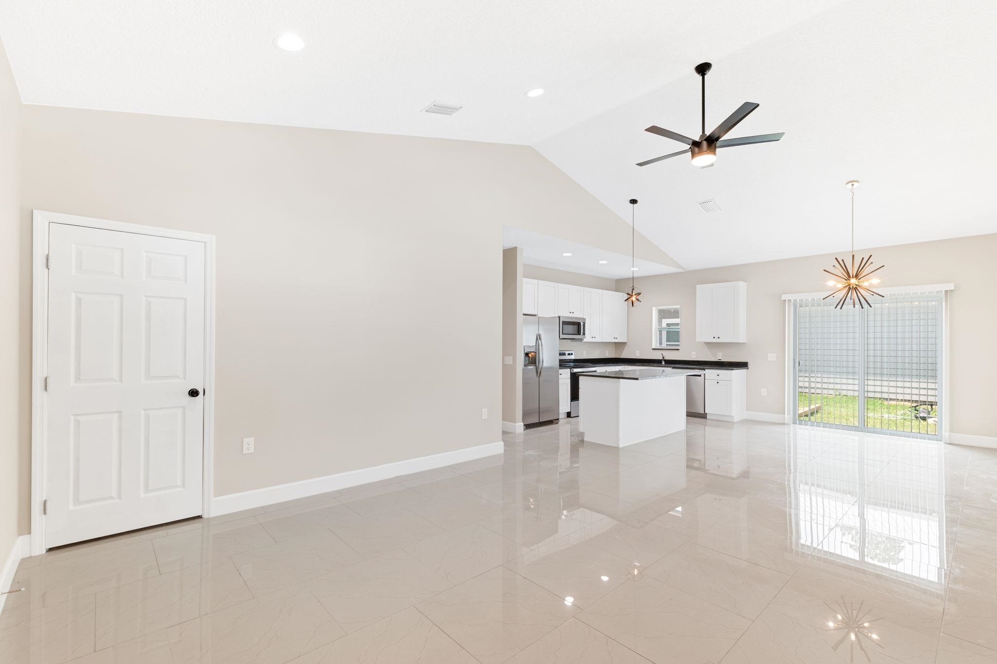 2770 Schaller Road St. Augustine, FL 32084 - Photo 6 of 29 a view of kitchen with furniture and refrigerator