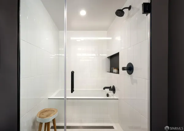 a bathroom with a sink and mirror