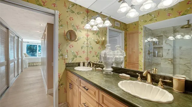 a bedroom with a bed and a mirror