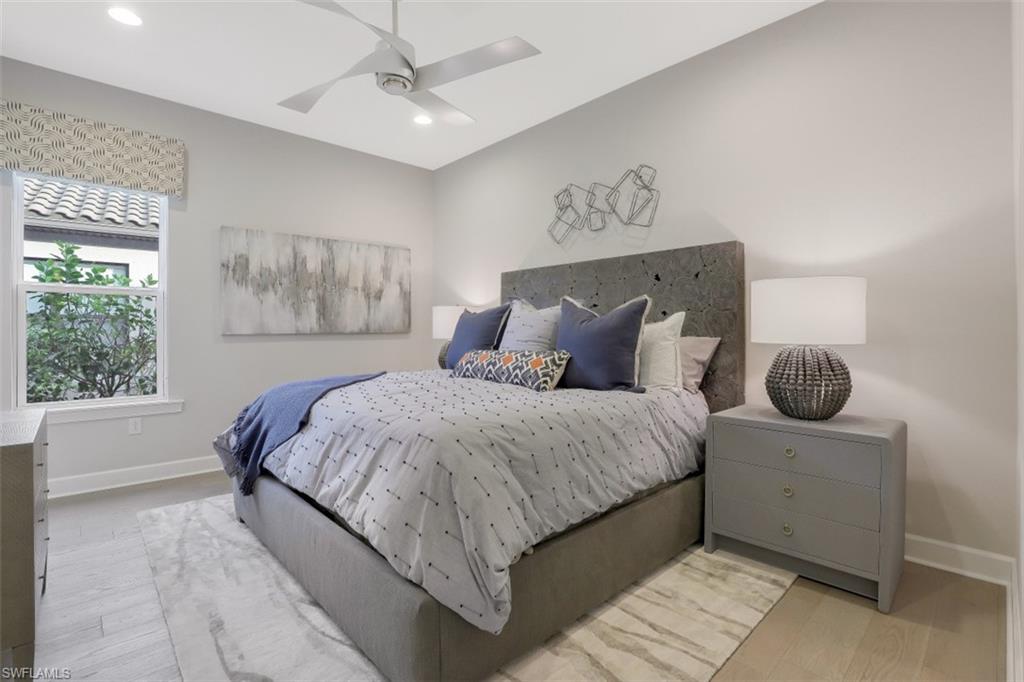 3258 Belon Lane Naples, FL 34114 - Photo 25 of 35 a bedroom with bed and window
