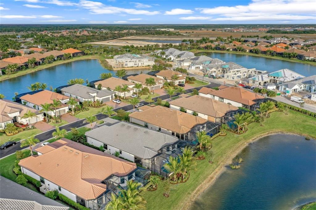3258 Belon Lane Naples, FL 34114 - Photo 7 of 35 an aerial view of residential houses with outdoor space