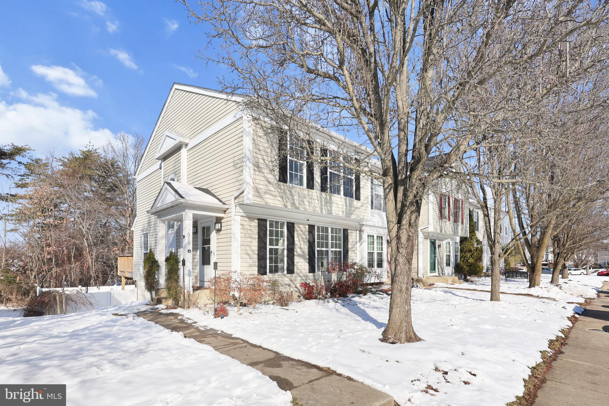 7510 Maury Road Baltimore, MD 21244 - Photo 1 of 39 a view of a house with snow on the road