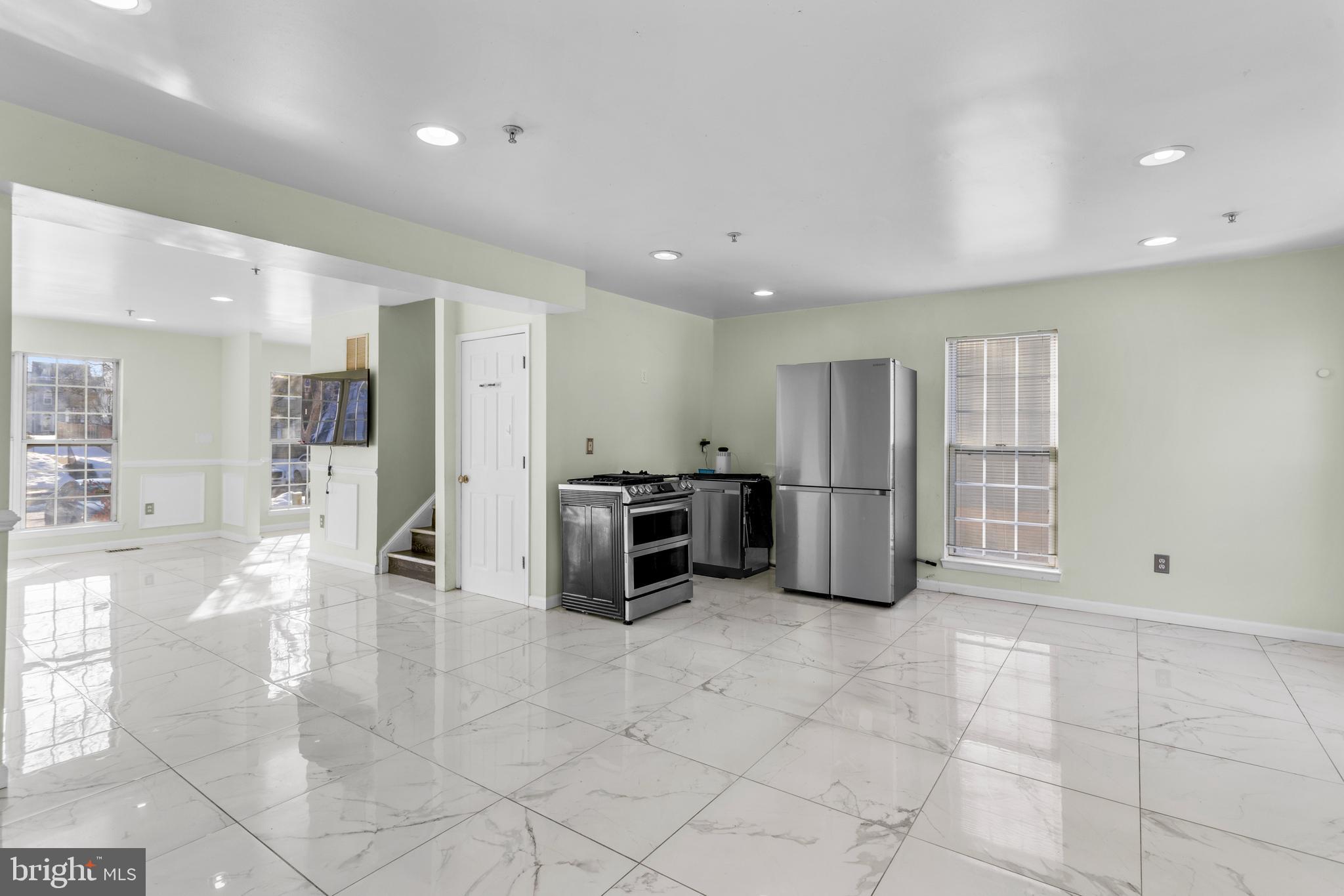 7510 Maury Road Baltimore, MD 21244 - Photo 11 of 39 a view of a kitchen with furniture and a refrigerator