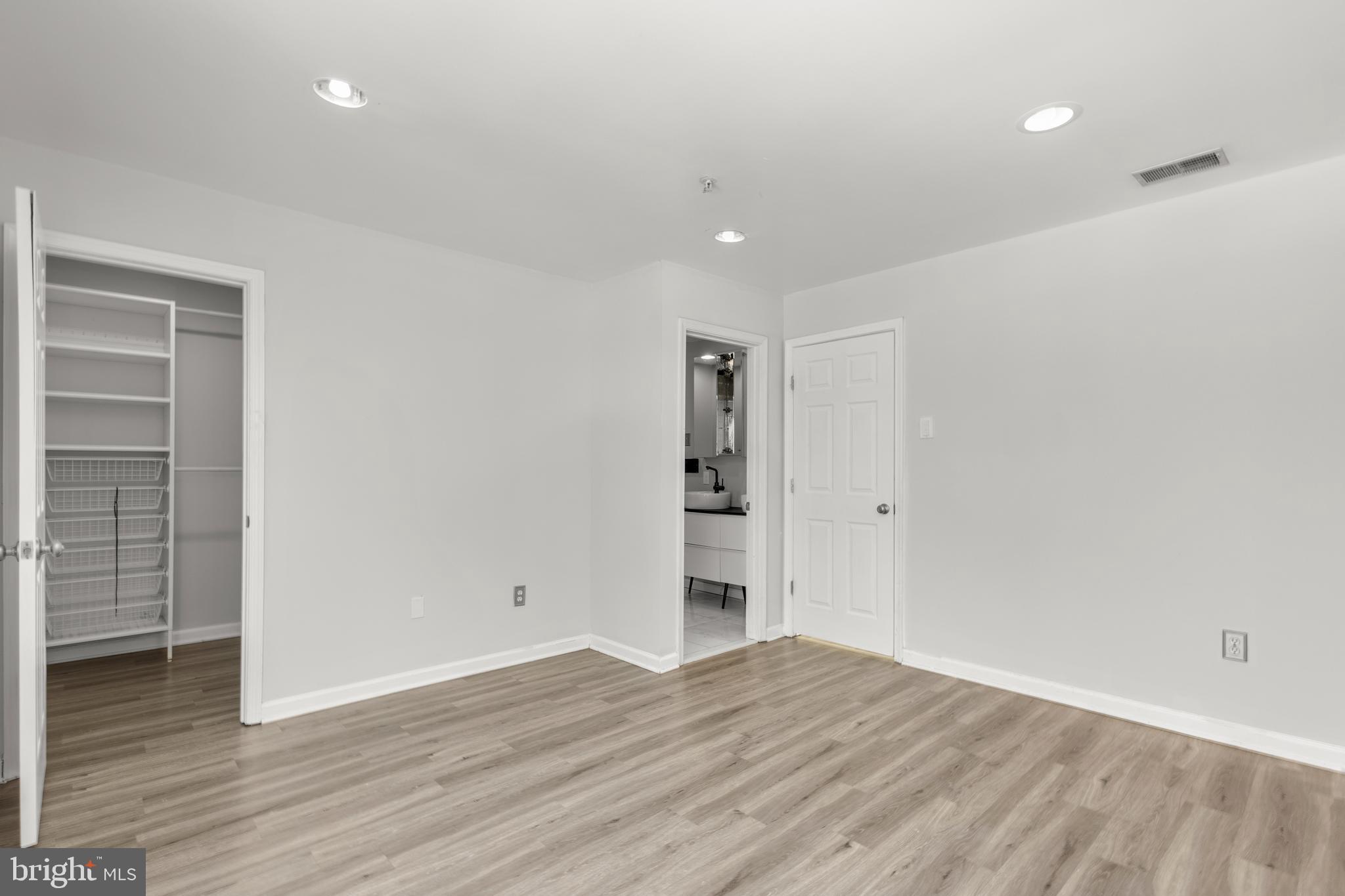 7510 Maury Road Baltimore, MD 21244 - Photo 16 of 39 a view of empty room with wooden floor
