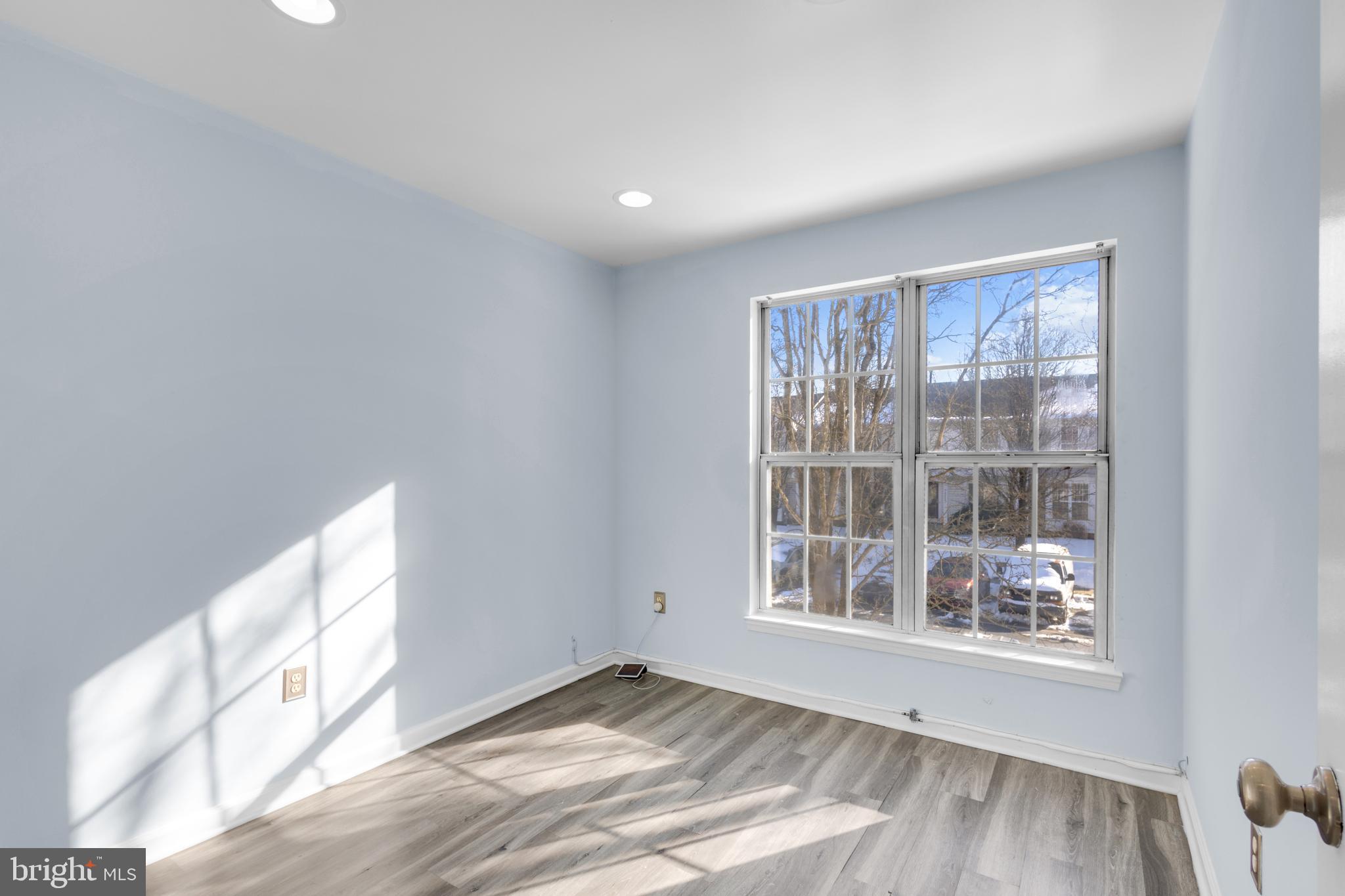 7510 Maury Road Baltimore, MD 21244 - Photo 23 of 39 a view of an empty room with a window