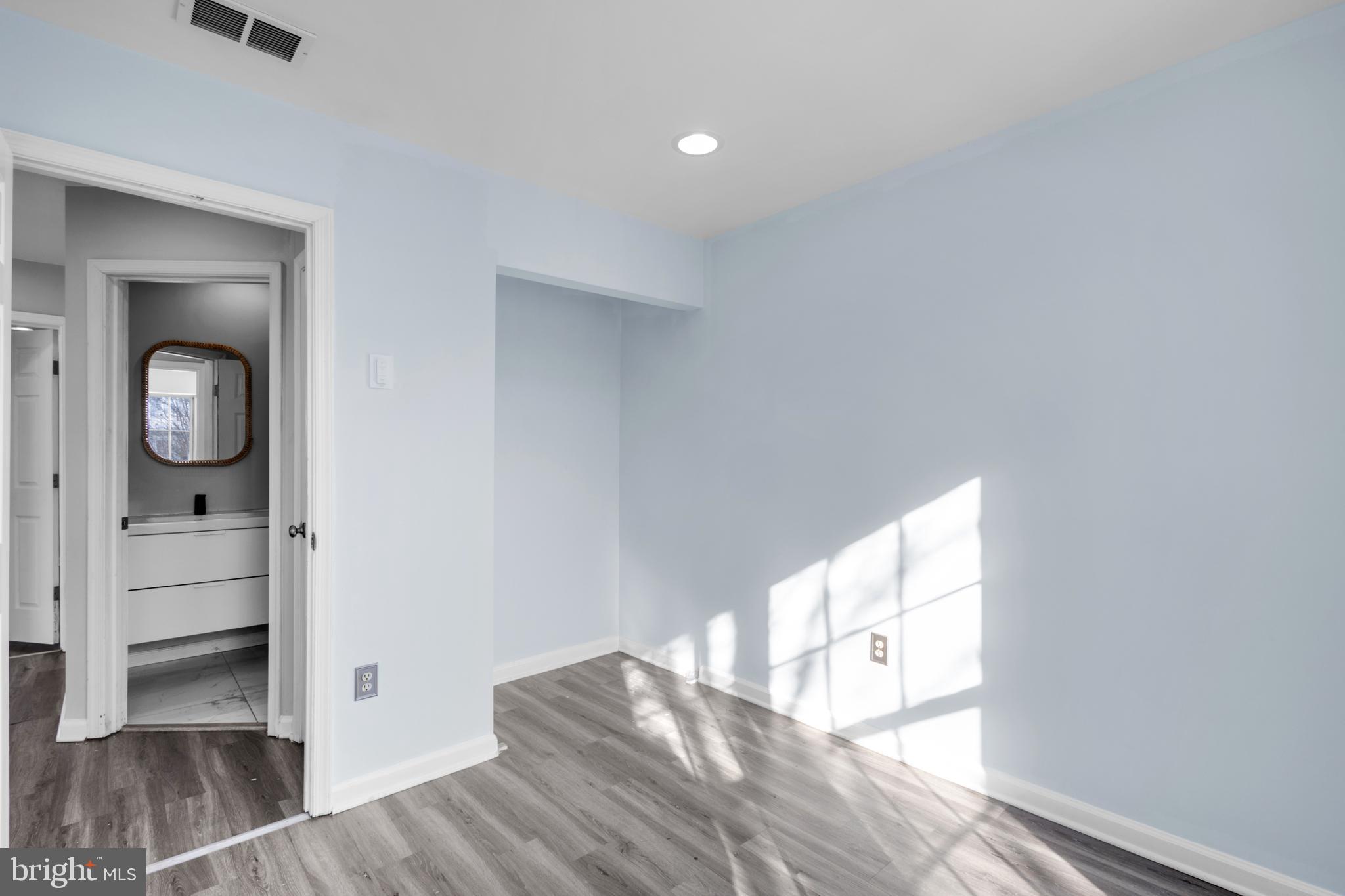 7510 Maury Road Baltimore, MD 21244 - Photo 24 of 39 a view of an empty room and wooden floor